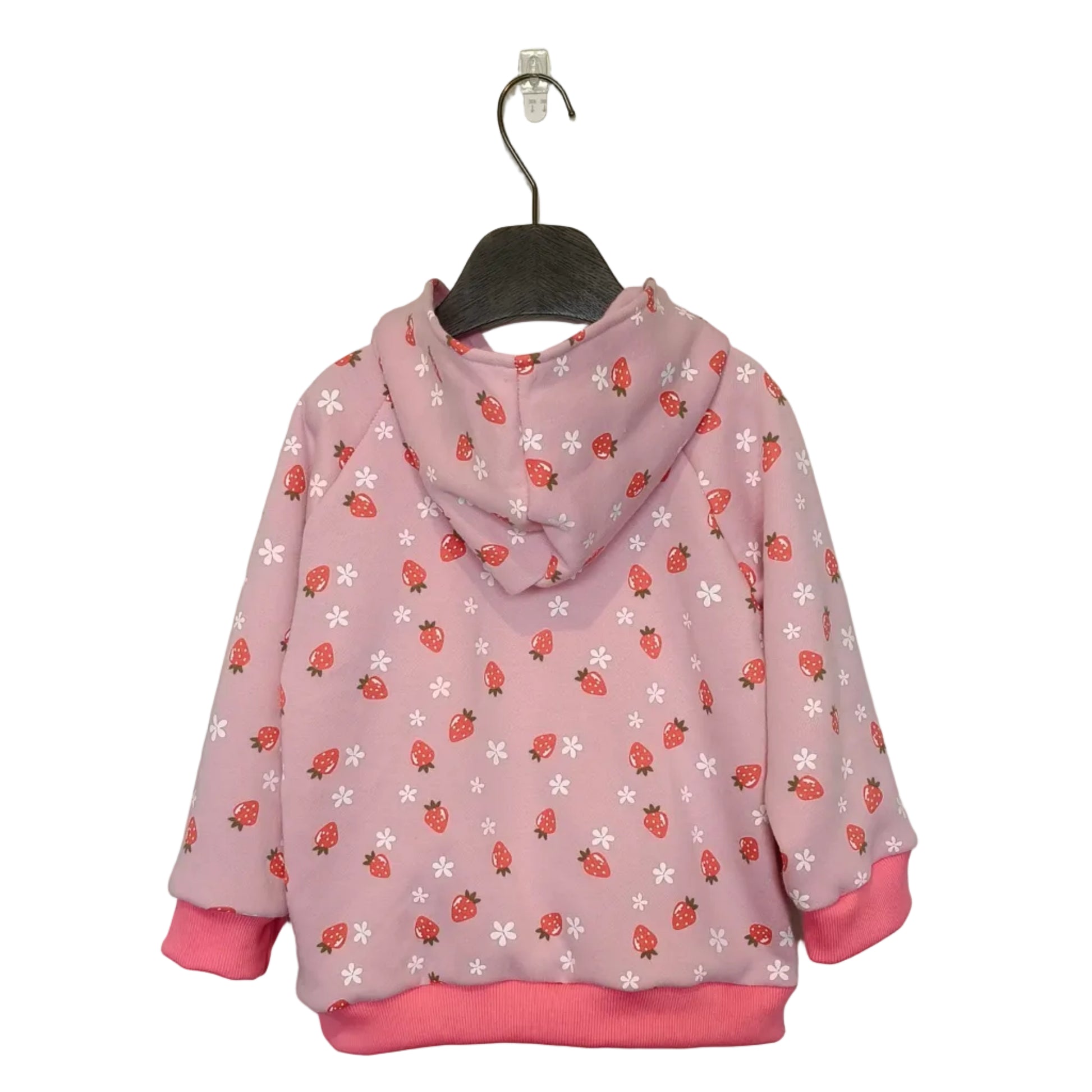 Pink hoodie with strawberry pattern on a hanger against a gray background