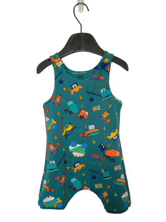 Children's romper with vehicle pattern on a hanger against a plain background